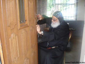 Bishop Antonios Fixing Door